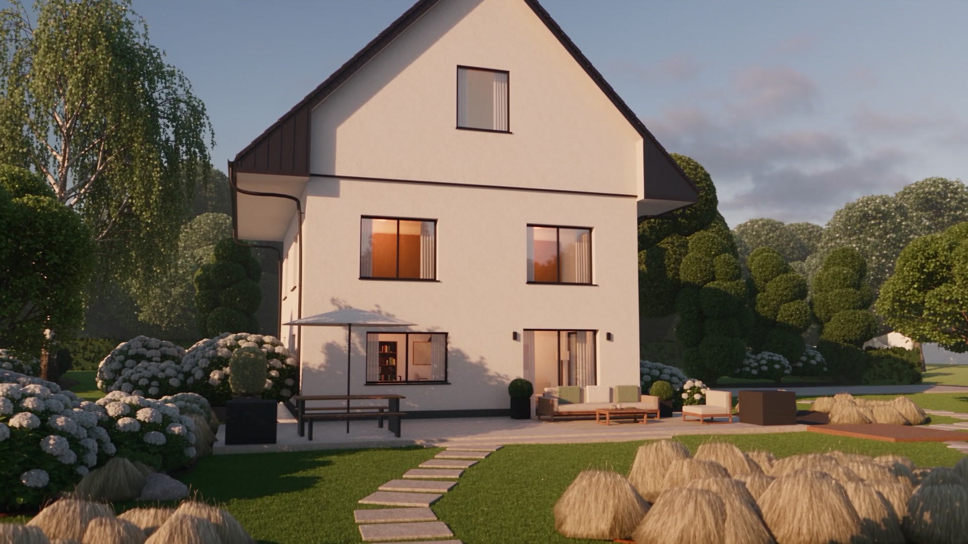 Das fertige Haus im Garten, im Licht des späten Nachmittags